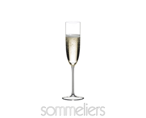 RIEDEL Sommeliers Champagne Glass filled with a drink on a white background