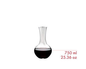 RIEDEL Performance Decanter filled with a drink on a white background