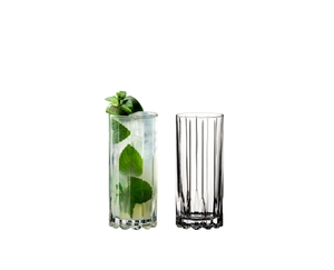 Two RIEDEL Drink Specific Glassware Highball glasses one filled with a drink and one unfilled on a white background.