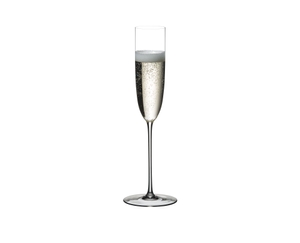 RIEDEL Superleggero Champagne Flute filled with a drink on a white background