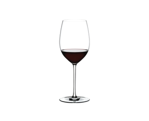 RIEDEL Fatto A Mano Cabernet/Merlot White R.Q. filled with a drink on a white background