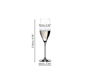 RIEDEL Vinum Cuvée Prestige glass filled with sparkling wine on white background