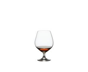 SPIEGELAU Vino Grande Cognac filled with a drink on a white background