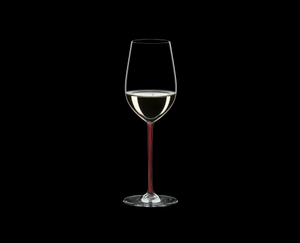 RIEDEL Fatto A Mano Riesling/Zinfandel Red R.Q. filled with a drink on a black background