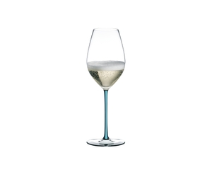 A RIEDEL Fatto A Mano Champagne Glass with a turquoise stem and filled with champagne.