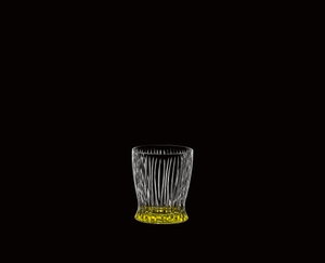RIEDEL Tumbler Collection Fire Whisky Easter Yellow on a black background