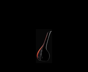 RIEDEL Decanter Black Tie Touch Red R.Q. filled with a drink on a black background