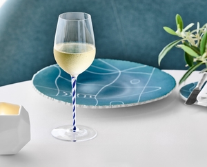 RIEDEL Fatto A Mano Champagne Wine Glass - blue white twisted - Hotel du Cap Eden Roc Edition in use