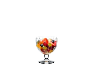 RIEDEL Sunshine Coupette filled with a drink on a white background
