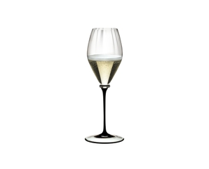 RIEDEL Fatto A Mano Performance Champagne Glass Black Stem filled with a drink on a white background