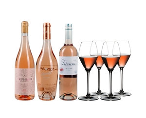 3 different closed bottles of rosé wine side by side and next to 4 rosé wine filled RIEDEL Extreme Rosé Wine/ Rosé Champagne glasses