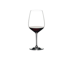 RIEDEL Heart To Heart Cabernet Sauvignon filled with a drink on a white background