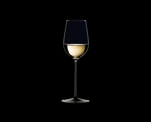 RIEDEL Sommeliers Black Tie Riesling Grand Cru filled with a drink on a black background
