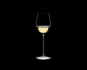 RIEDEL Superleggero Viognier/Chardonnay filled with a drink on a black background