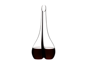 RIEDEL Decanter Black Tie Smile filled with a drink on a white background