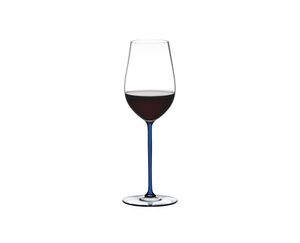 RIEDEL Fatto A Mano Riesling/Zinfandel Dark Blue filled with a drink on a white background