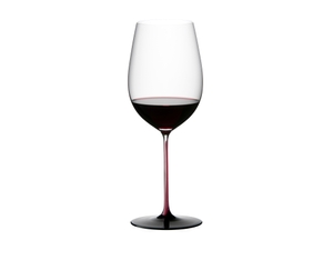 RIEDEL Black Series Collector's Edition Bordeaux Grand Cru filled with a drink on a white background