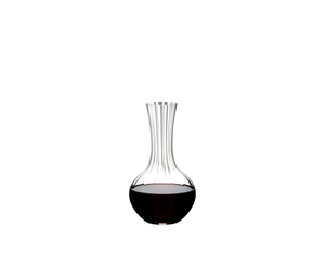 RIEDEL Performance Decanter filled with a drink on a white background
