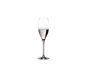 RIEDEL Vinum Cuvée Prestige filled with a drink on a white background