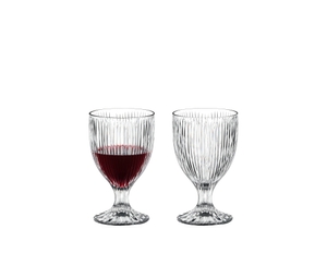 RIEDEL Tumbler Collection Fire All Purpose Glass filled with a drink on a white background