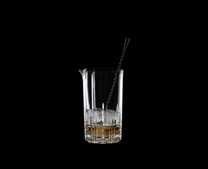 SPIEGELAU Perfect Serve Mixing Glass filled with a drink on a black background