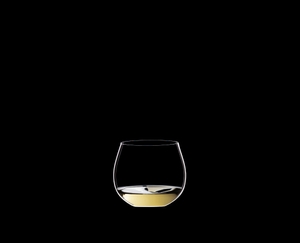 RIEDEL Restaurant O Oaked Chardonnay filled with a drink on a black background