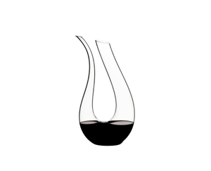 RIEDEL Amadeo Decanter filled with a drink on a white background