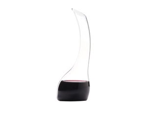 RIEDEL Decanter Cornetto Single R.Q. filled with a drink on a white background
