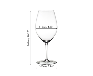 A RIEDEL Wine Friendly Magnum glass filled with white wine against a white background.