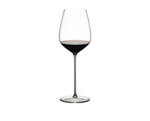 RIEDEL Max Cabernet filled with a drink on a white background