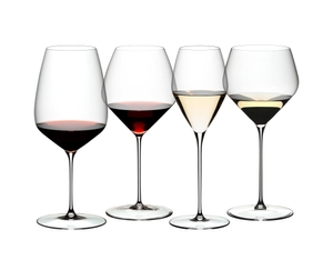 RIEDEL Veloce Tasting Set filled with a drink on a white background