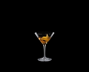 SPIEGELAU Perfect Serve Cocktail Glass filled with a drink on a black background
