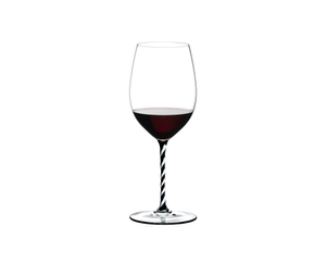 RIEDEL Fatto A Mano Cabernet/Merlot Black & White R.Q. filled with a drink on a white background