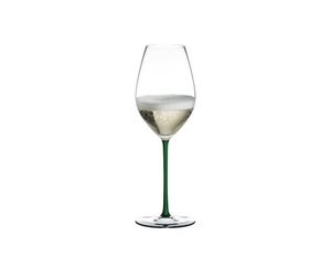 RIEDEL Fatto A Mano Champagne Wine Glass Green filled with a drink on a white background