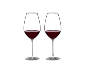 RIEDEL Veritas Cabernet Shiraz filled with a drink on a white background