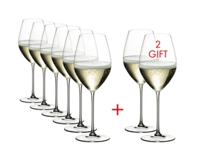 Six RIEDEL Veritas Champagne Wine Glasses plus two filled with champagne tand side by side or slightly behind each other on a white background.