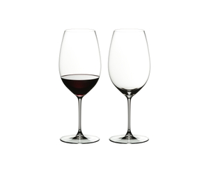 RIEDEL Veritas New World Shiraz filled with a drink on a white background