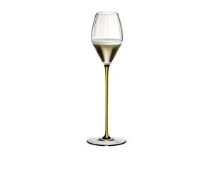 A RIEDEL High Performance Champagne Glass with a yellow stem filled with champagne on a transparent background. 