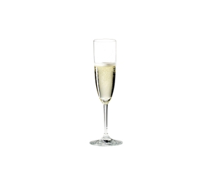 RIEDEL Vinum Champagne Glass filled with a drink on a white background