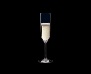 RIEDEL Wine Champagne Glass filled with a drink on a black background