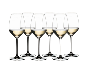 RIEDEL Extreme Riesling filled with a drink on a white background
