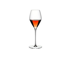 A RIEDEL Veloce Rose glass filled with rose wine on a white background.