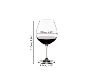 A red wine filled RIEDEL Vinum Pinot Noir (Burgundy red) glass on white background