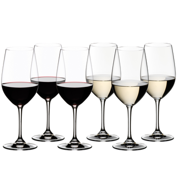 6 RIEDEL Vinum Riesling Grand Cru/Zinfandel glasses stand offset in 2 rows side by side. The first three wine glasses are filled with red wine, the others are filled with white wine.