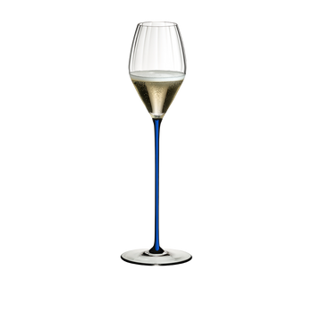 A RIEDEL High Performance Champagne Glass with a darkblue stem filled with champagne on a transparent background.
