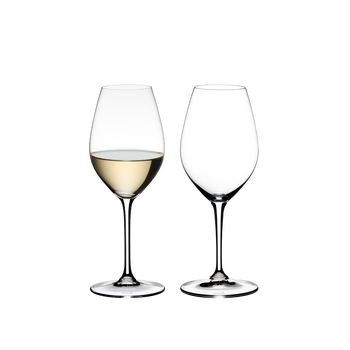 Two RIEDEL Wine Friendly White Wine / Champagne Wine Glasses side by side against a white background. The glass on the left side is filled with white wine, the glass on the right side is empty.