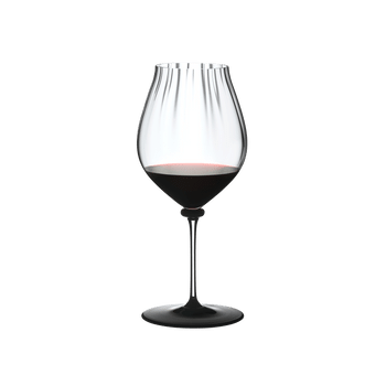RIEDEL Fatto A Mano Performance Pinot Noir Black Base filled with a drink on a white background