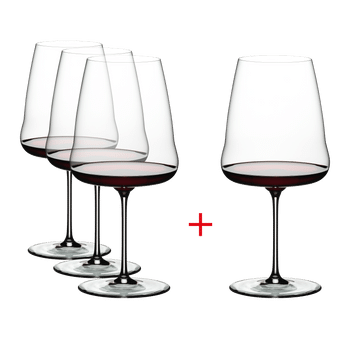 Three RIEDEL Winewings Cabernet/Merlot glasses plus one filled with red wine on a white background.