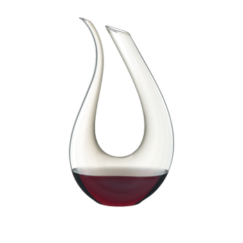 RIEDEL Decanter Amadeo Grigio filled with a drink on a white background