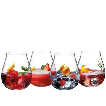Four RIEDEL Gin Set Contemporary glasses filled with different cocktails slightly offset side by side
